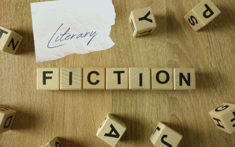 Literary fiction written on paper and letter blocks. 