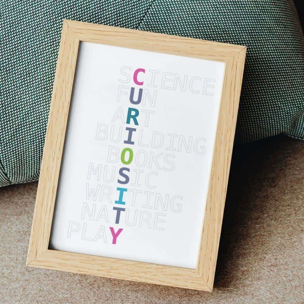 Curiosity wall art in jewel colors in a wooden frame