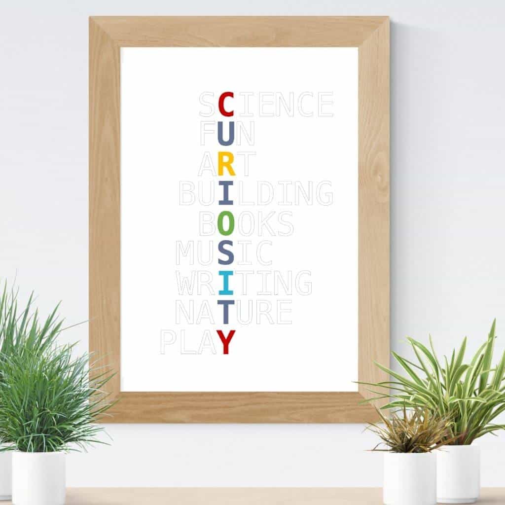 Curiosity wall art in a frame in primary colors